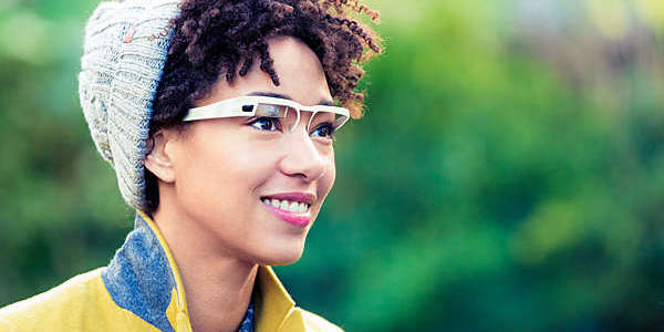 Woman with a wearable computer in the form of smart glasses.